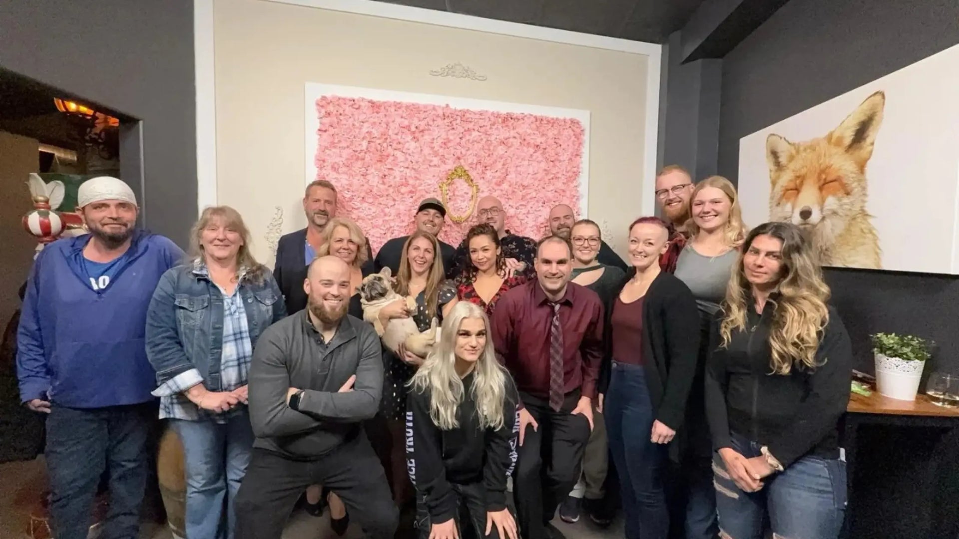 Group smiling after corporate comedy show